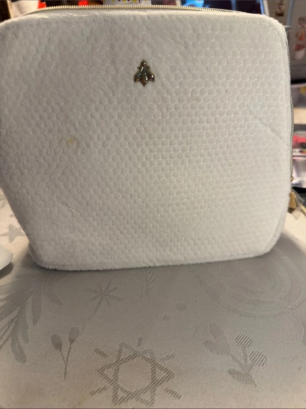 White Textured Cosmetic Bag with Gold Bee Accent